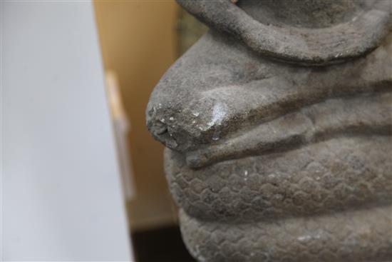 A Cambodian sandstone seated figure of Buddha Muchalinda